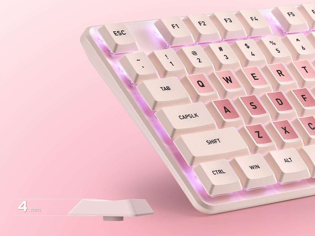 A close-up of a mechanical keyboard with cream-colored keys and pink-accented keys, illuminated b...