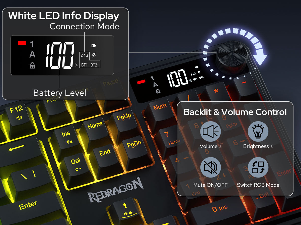 Close-up of a REDragon mechanical keyboard with an illuminated white LED display showing battery ...